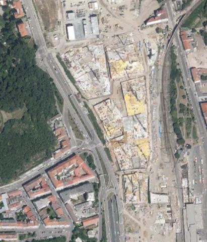 Historical aerial context of Smíchov City, Prague. No fictional phase boundary or completion finding is mapped.